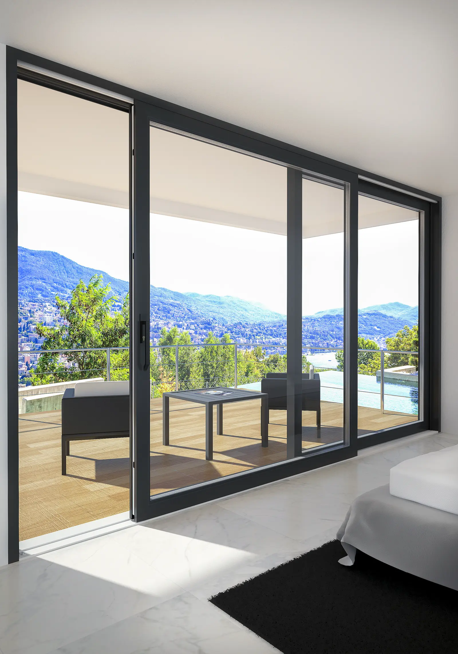 Hebeschiebetür im Schlafzimmer mit Blick auf Terrasse und Bergpanorama
